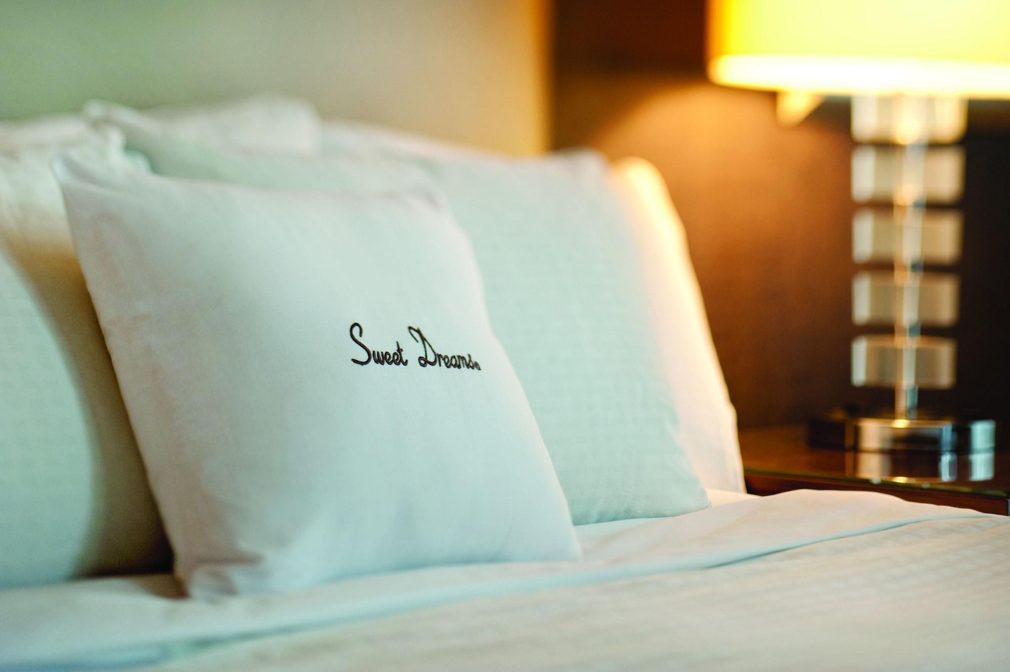 Doubletree By Hilton Kuala Lumpur Hotel Екстериор снимка A pillow with the "Sweet Dreams" logo